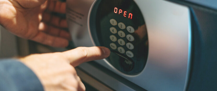 Someone opening a safe.