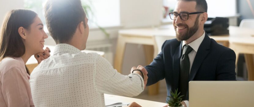 A couple meeting with a financial planner.